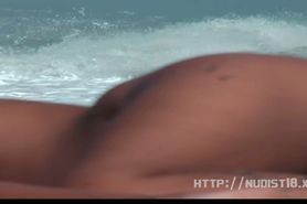 Nudist teen not shy about posing nude at the beach - video 1