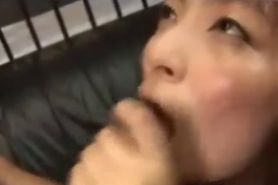 Japanese girl jerks him in her mouth