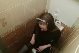 hidden camera in the toilet. hot schoolgirl masturbates her tight wet pussy