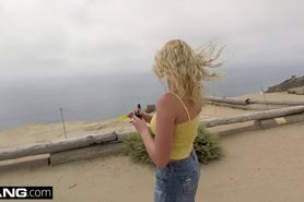 Sophia Lux gets naked and sucks cock at the beach