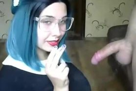 Busty young girl giving sexy smokey blowjob