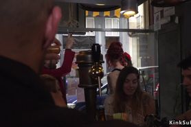 Spanish babe takes bondage in public bar