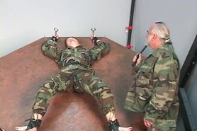 Restrained soldier girl gets her tits bared and nips tortured by master