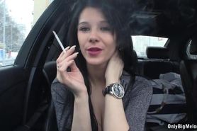 The beautiful Adrianne Black smoking sexy in car