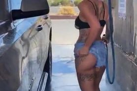 Dylan Phoenix washes a car in shorts and shows off her sexy legs