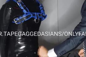 Rubber slave rubber suit tape gagged and edged cum control