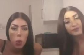 Two gorgeous tan skinned brunette babes smoking sexy