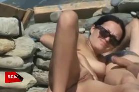 Couple fucking on the beach filmed by a voyeur