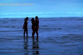Naked swinging couples on public beach - Brazil