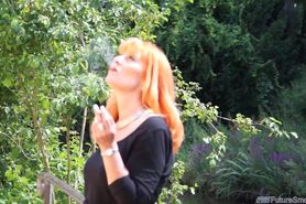 Mature German Smoker Claudia by the river