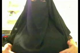 Arabian Muslim Ummah Lady in Black Burqa shows Huge Oriental Beurette Boobs