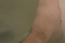 Sexy gey loves footfetish and plays with his toes in the water and shows his perfect foot