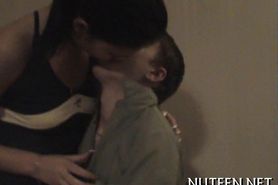 Teen gal kisses lips of her boyfriend