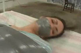 Mummy taped girl can't escape