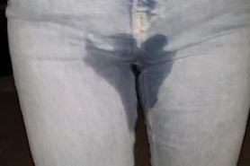 Girl pissing pants at night