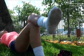 Pervert likes Sweaty feet in socks at the park.