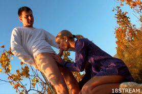 Outdoors teen sex in doggy-style pose