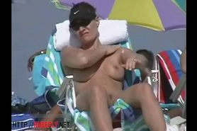 NUDIST VIDEO - Couple split by Strangers on a nude beach - video 1