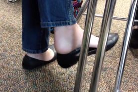 Candid flats dangling and shoeplay in class