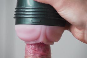 Extreme close up of dick in slow motion with Fleshlight and finished by cumshot
