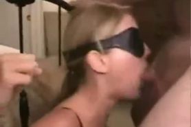 Cute blonde tied and blindfolded blows and gets a facial