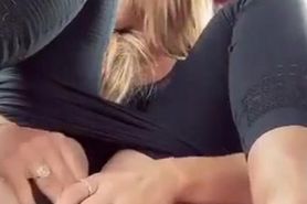 Hot blond fucks her dildo in back seat of car