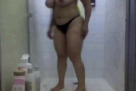 Big tits taking a shower