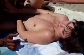 Interracial sex on the beach - video 1