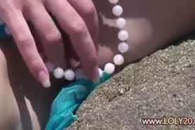 Beads on my pussy on the beach