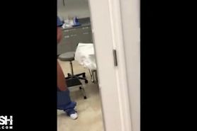 Nurse Flashing at Work in Hospital