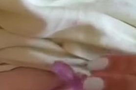 Innocent teen stimulates her nipple with pink vibrator