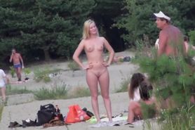 Voyeur of blonde nudist standing so everyone can see her amazing slut body