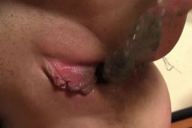 Tasty cherry lips rubbed by a dildo