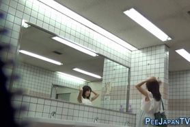 Japanese whore urinates for spycam