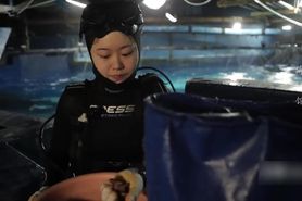 Cute chinese girl hooded wetsuit