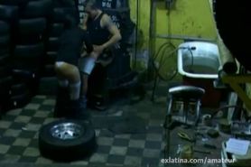 Latina amateur screws mechanic in shop