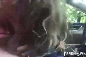 Excited Blonde Blowing In A Car