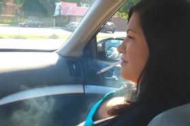 Busty Latina girl Christina smoking sexy in car