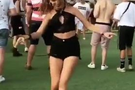 Beautiful hot sexy girl dancing on concert