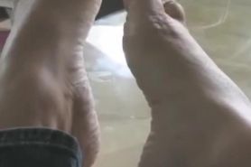 mature wrinkled soles toe wiggle