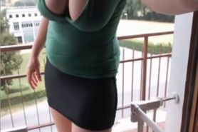 Girl stripping on balcony, nice body