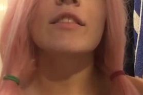 pink haired girl begs for cum on her face while rubbing her boobs