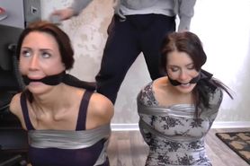 2 BRUNETTE BOUND AND TAPE GAGGED FEET