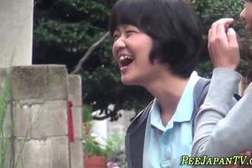 Wild asian teens urinating outdoors