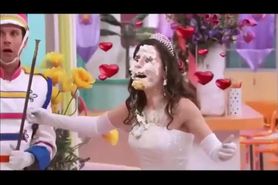 Bride accidentally gets a cake in her face