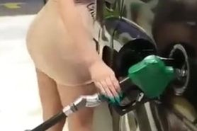 Showing hot body at a gas station
