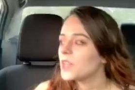 Sexy young brunette smoking & driving