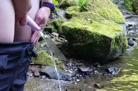 Pissing with my go girl into the river