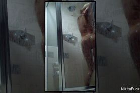 Nikita Von James taking a shower