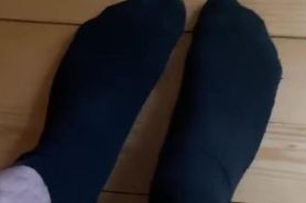 Shy boy shows his feet in dirty socks for satisfaction of his footfetish